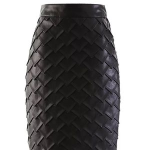 Beautiful faux leather pencil skirt with triangle fold and a small split